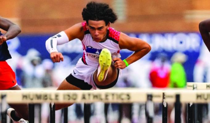 Steven Schwartz (middle) running and jumping over hurdles at the Junior Olympics. COURTESY PHOTOS