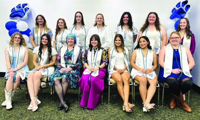 Graduates of the Blinn College Veterinary Technology Program who were pinned were (front, from left) Maggie Coyle, Kaitlynn O’Quinn, Stephanie White, Megan Wilson, Kynlee Hall, Lizbeth Granados, and Michelle Emily Nielsen; and (back, from left) Sam Dolezal, Riley Ellebracht, Kenna Killough, Autumn Teach, Layla Alkowatli, Sydney Jones, and Jourdan Begnaud.