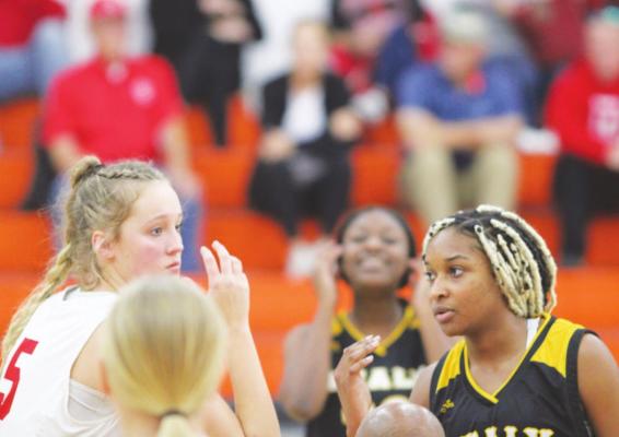 Sealy junior Jasmyne Joiner readies for tipoff against Columbus during last weekend’s tournament Dec. 3. CONTRIBUTED BY TRENTON WHITING/COLORADO COUNTY CITIZEN