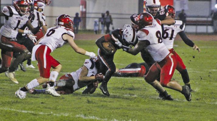 The Brazos High School Cougars defend against a drive by the Kountze High School Lions Sept. 2. PHOTO COURTESY OF DANNIE OLIVEAUX/THE EXAMINER
