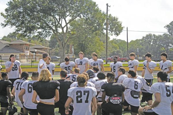 JASON MANAGO-GRAVES Sealy High School Tigers head varsity football coach Shane Mobley addresses the seniors following practice Monday morning Aug. 15 at T.J. Mills Stadium.