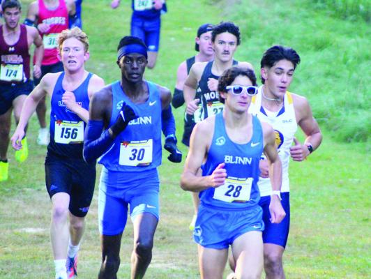 Blinn’s Christian Gonzalez &amp; Eric Lagat head down the course at the Watson XC Classic for Blinn College.