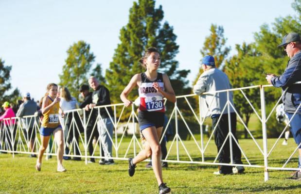 Cougarette junior Esmeralda Garcia competes in the Class 3A State Championship cross country meet at Old Settlers Park in Round Rock Nov. 5. Garcia’s second-place finish was the best in school history.