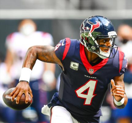 Houston Texans quarterback Deshaun Watson escapes the pocket during a non-divisional matchup with the New England Patriots at NRG Stadium on Nov. 22, 2020. Watson finished the season atop the passing yard rankings despite a 4-12 season. Photo courtesy Houston Texans