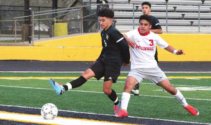 Sealy’s Carlos Augueven twists a shot on net that snuck past the Bellville keeper and opened the scoring for the Tigers at Monday night’s District 20 contest on Mark A. Chapman Field at T.J. Mills Stadium. Sealy won 2-0 to secure second place. COLE McNANNA