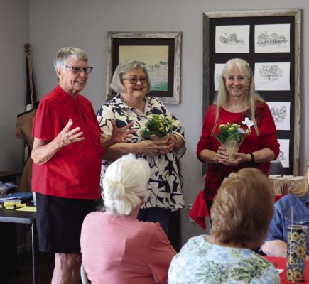 From left, Joan Buenger, Doris Glenewinkel, and Pat Allee during the awards ceremony, officer installation.