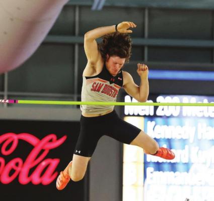 Sam Houston State senior Clayton Fritsch competes in the pole vault competition at the Southland Conference Indoor Championship meet last weekend in Alabama. The Sealy High School alum earned the top spot in the event in his final chance. CONTRIBUTED PHOTO