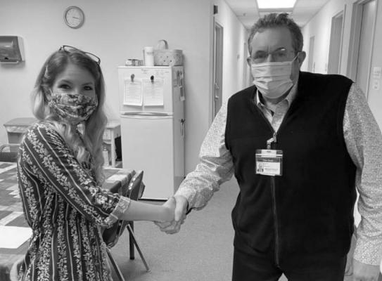 Bellville Medical Center CEO Daniel Bonk welcomes Renee Poulter as the Community and Clinical Coordinator for Tri-County ER, an emergency department of BMC in Sealy, at the beginning of March. CONTRIBUTED PHOTO