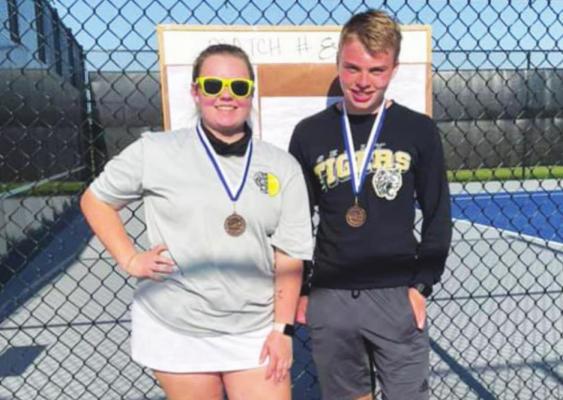 Abigail Zientek and Seth Pine bounced back from an early loss and earned first place in the mixed doubles consolation bracket at the Navasota Invitational April 1.