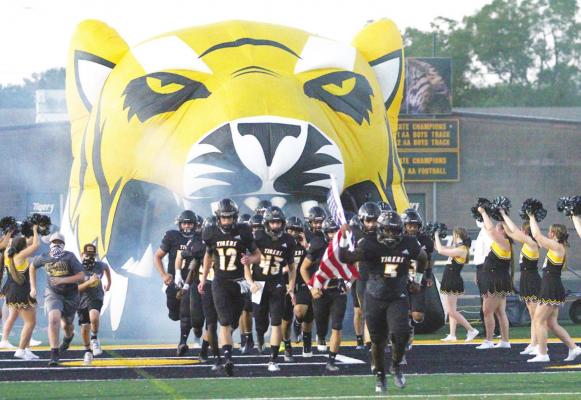 The Sealy Tiger football team takes the field ahead of its non-district contest against Bay City Sept. 25, 2020, at T.J. Mills Stadium. A new UIL ruling allows continued video broadcasts of high school football games for the 2021 season. COLE McNANNA
