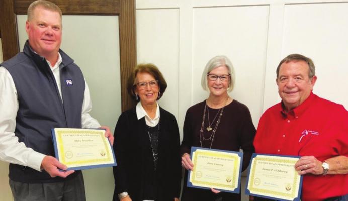 Bellville Hospital Foundation’s Marcella Schomburg presented certificates of appreciation for past years of service and a new certificate identifying each person as a member of the Advisory Board. Pictured from left to right are Mike Mueller, Schomburg (Foundation Board Chair), Jane Causey, and Jim O’Jibway. Not pictured due to prior commitments are Anne Ford, Gloria Neumann, and Margie Lovel. CONTRIBUTED PHOTO