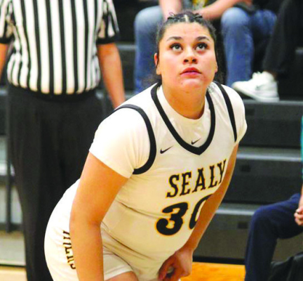 Estella Alvarez gets ready to try and snatch up a rebound opportunity after a free throw shot. SEALY NEWS | EVAN HALE