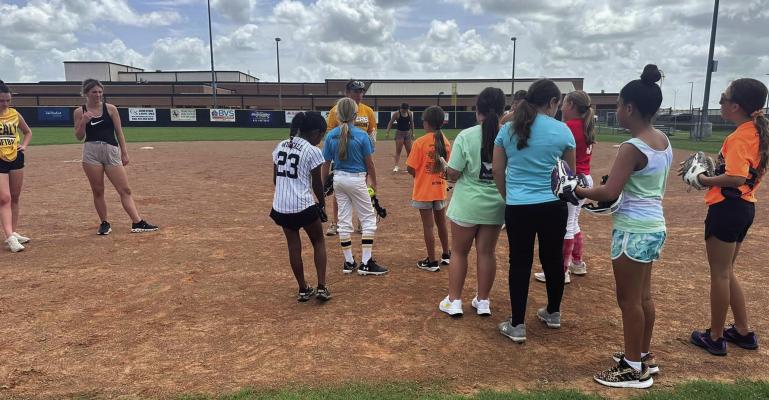 Sealy softball camp works with area campers