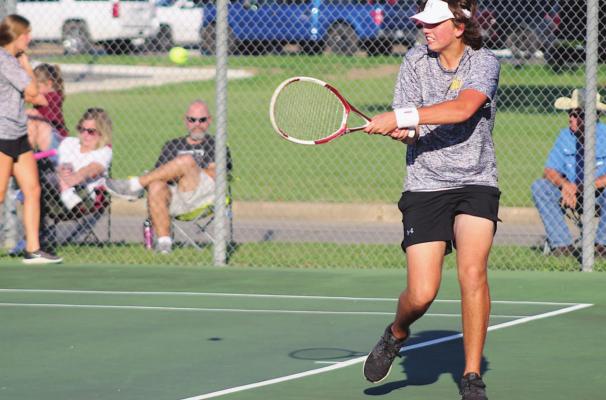 Daniel Eschenburg returns a volley during the Tigers’ final regular-season match against Wharton Oct. 5 at home. Eschenburg and the second-place Sealy squad earned a bye through the first round of the playoffs. COLE McNANNA