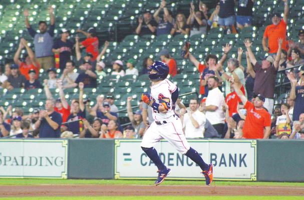 Astros second baseman Jose Altuve rounds first base after a leadoff home run against the Texas Rangers June 16 at Minute Maid Park in Houston. Altuve provided the walk-off home run that capped a six-run ninth inning to beat the Yankees Sunday. COLE McNANNA