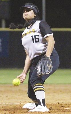 COLE McNANNA Sealy senior Kayla Camacho fires a pitch during the Lady Tigers’ regularseason opener against Bay City at home last Tuesday evening.