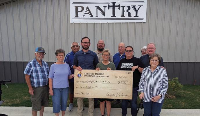 Knights donate to Sealy Christian Pantry