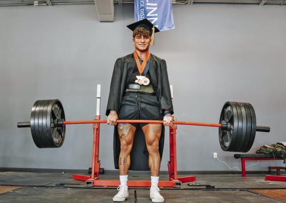 Jeremiah Metzgar shows off his strength in his high school graduation photo. CONTRIBUTED PHOTOS
