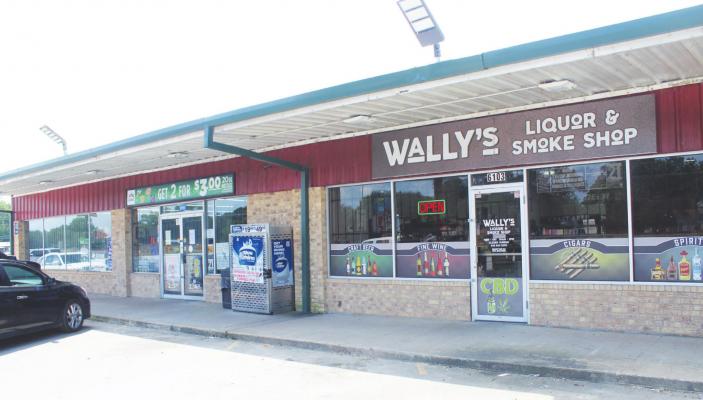 The Walimomin brothers run Wallis Quick Stop and Wally’s Liquor and Smoke Shop, located adjacently on Highway 36 in Wallis. HANS LAMMEMAN