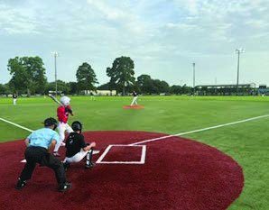 The Sealy Tigers take the field against Columbus in summer league action in another competitive game as both teams continued to prepare for the upcoming season. COURTESY PHOTO