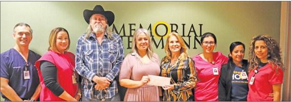 Last month’s Bras for a Cause event held in Sealy raised a record-setting amount of $23,200 that was donated to the Memorial Hermann Breast Cancer Center in Katy. The event, in its eighth year, was hosted by Saddleback Bar and Grill and The Sealy News. At the check presentation were, left to right, Dr. Sean Bender, Mocena Malik, Tom Mendenhall Saddleback Saloon Bar and Grill, Jill Jackson, Karen Lopez, with the The Sealy News, Marta Velasquez, Linda Gaitan, Jessica Garza. CONTRIBUTED PHOTO