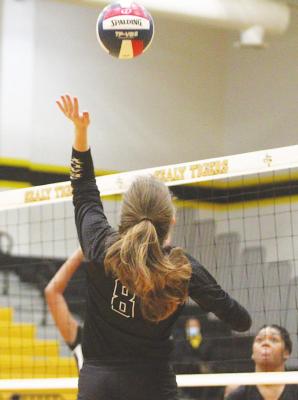 Lady Tiger senior Darby Sanders sends a ball over the net in Sealy’s bi-district playoff game against North Forest at home on Oct. 29, 2020. Sanders was one of five seniors who earned academic all-state distinction from the Texas Girls Coaches Association.