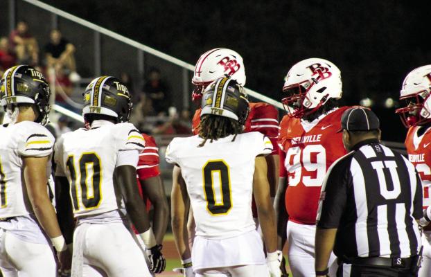 Captains for Sealy and Bellville meet at midfield prior to the kickoff of last Friday’s contest at the Pasture of Pain. Bellville outlasted Sealy in overtime to claim bragging rights to the county for another year. Sealy will look to rebound this week as they host Giddings at 7:30 p.m. PHOTO BY WILSON CHANEY