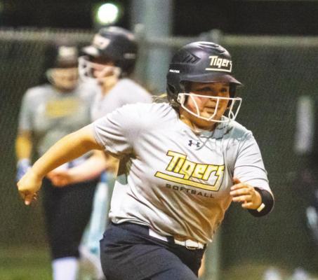 Sealy senior Melanie Nieto runs out an RBI groundout during the Lady Tigers’ final scrimmage against Bay City at home Feb. 11. COLE McNANNA