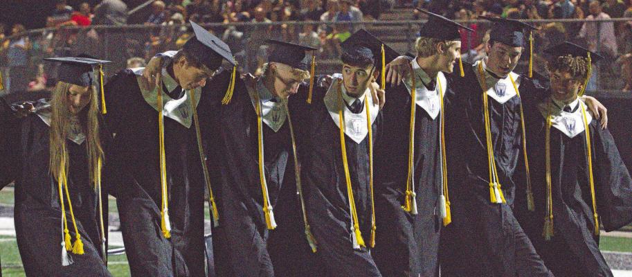 Graduates are arm in arm dancing in celebration. PHOTOS BY ABENEZER YONAS