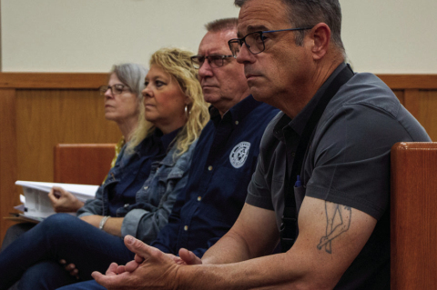 Donald Darracq, Bryan Haevishchan, Kim Spacek and Liz Cubz watch public comments about data centers during Austin County Commissioners Court, Monday, June 8, in Bellville. PHOTO BY THE SEALY NEWS | ALLISON DRINNON