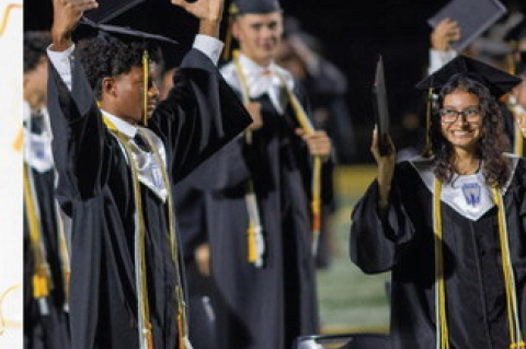 Sealy High School graduates Brandon Burditt (left) and Veyda Baena celebrate receiving their diplomas during the Class of 2026 graduation ceremony, Thursday, May 21, at TJ Mills Stadium.
