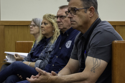 Donald Darracq, Bryan Haevishchan, Kim Spacek and Liz Cubz watch public comments about data centers during Austin County Commissioners Court, Monday, June 8, in Bellville. PHOTOS BY THE SEALY NEWS | ALLISON DRINNON