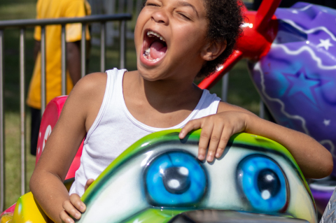 Legend Andrus can hardly contain his excitement as he enjoys a carnival ride Saturday, June 27, at the All for One Festival in Sealy. PHOTOS BY SEALY NEWS | ALESIA WOOLRIDGE