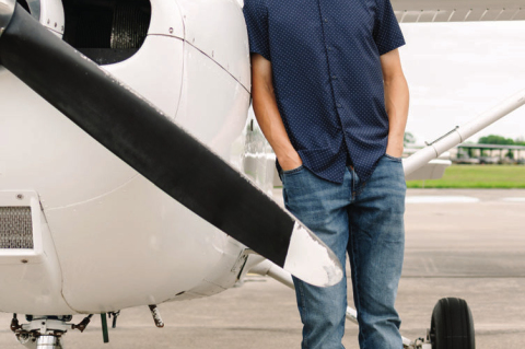 Sealy graduate and future Air Force Academy cadet Jackson Blanks stands next to a plane.
