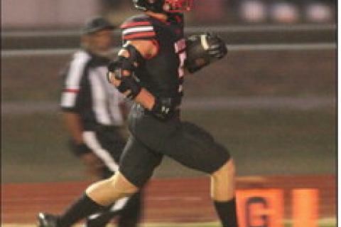 Luke Polasek runs in a touchdown during a game against Schulenburg on Sept. 19, 2025, at Wallis Brazos High School.