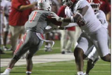 Don Gillum tries to fight off a blocker during a game against Columbus on Friday, Sept. 26, 2025, at Bellville High School. PHOTOS BY SEALY NEWS | EVAN HALE
