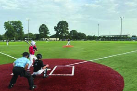 The Sealy Tigers take the field against Columbus in summer league action in another competitive game as both teams continued to prepare for the upcoming season. COURTESY PHOTO